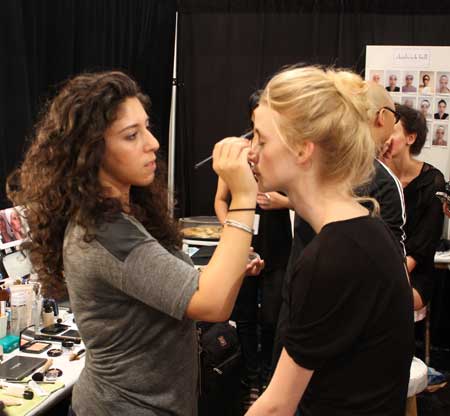 filling-in-brows-backstage-at-chadwick-bell-spring-2013