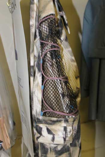 purple-cording-on-sleeve-of-jacket-backstage-at-jen-kao-ss13